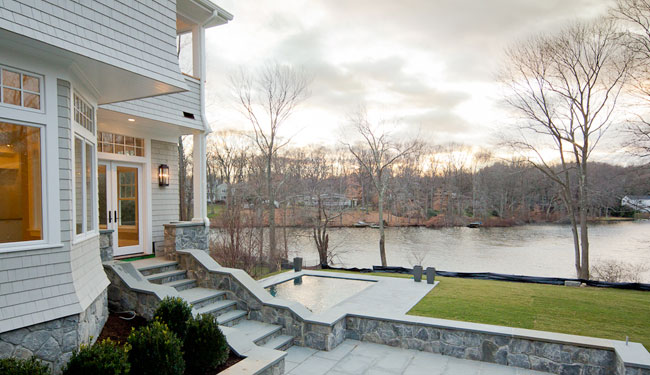 Milton Westport colonial with waterfront views of Nash pond.
